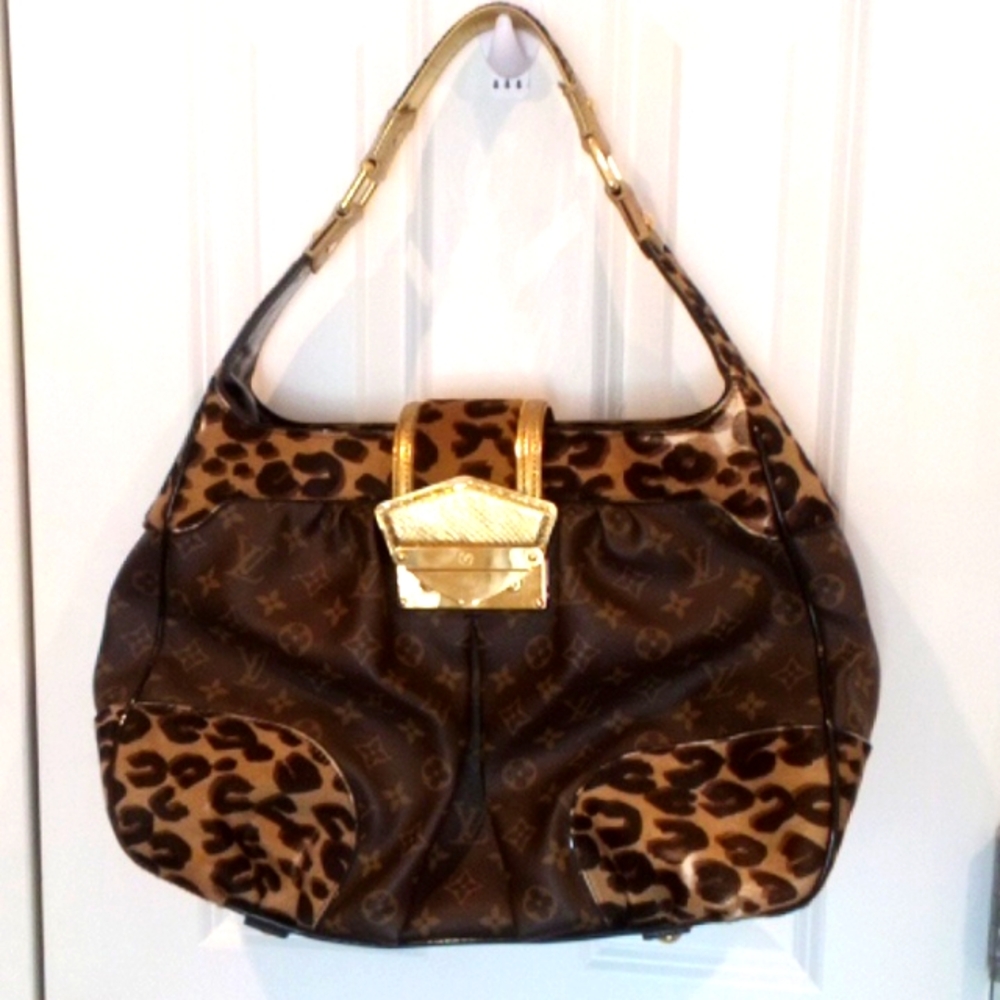 Rare Luxury Brown and Gold Louis Vuitton monogram Designer Women's Bag.